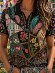 Vintage-style casual polo shirt featuring a London Notting Hill Carnival print
